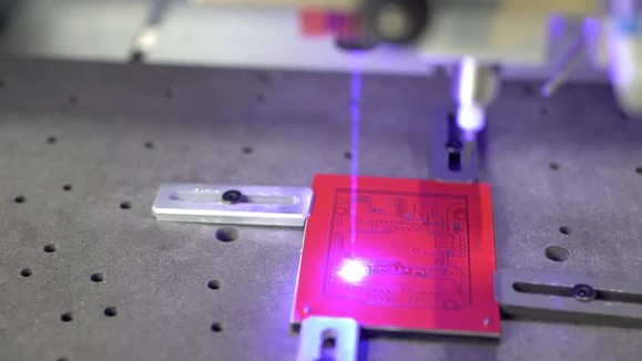 Makera PCB Fabrication Pack laser engraving the silkscreen 